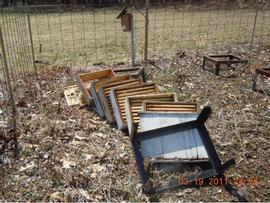  Toppled hive due to soft dirt; photo by Dewey M. Caron
